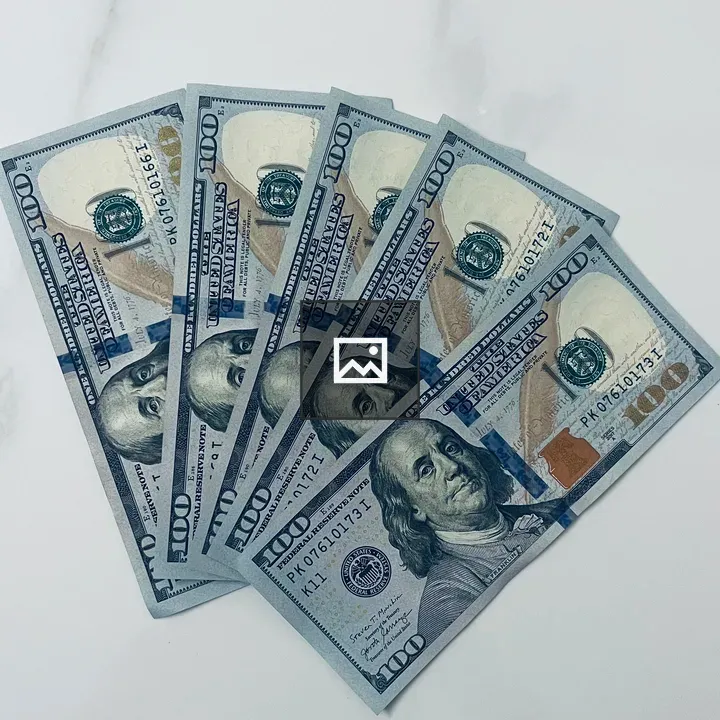 Five Hundred Dollar Bills on Marble