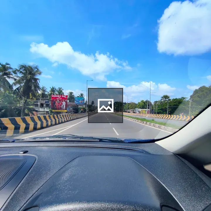 Road View from a Vehicle Window