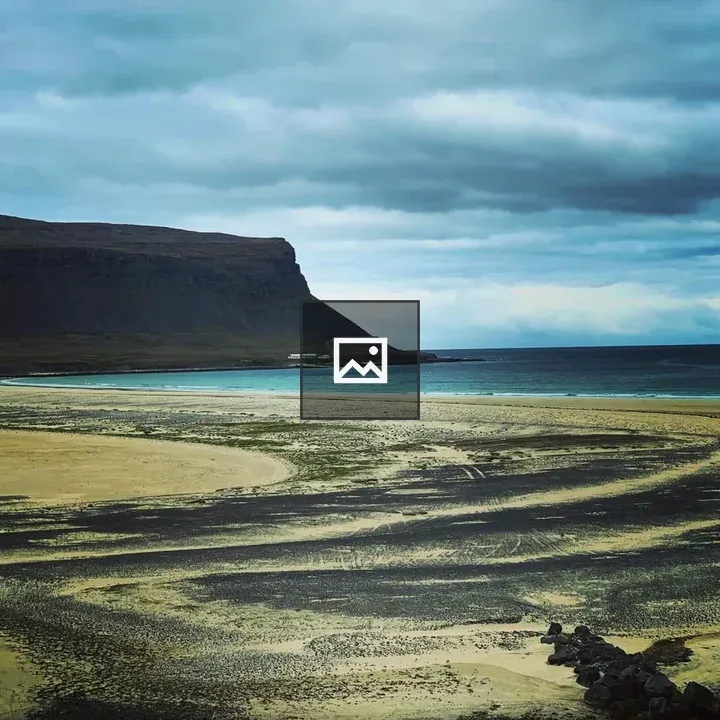 Cliffs shore and water in Westfjords