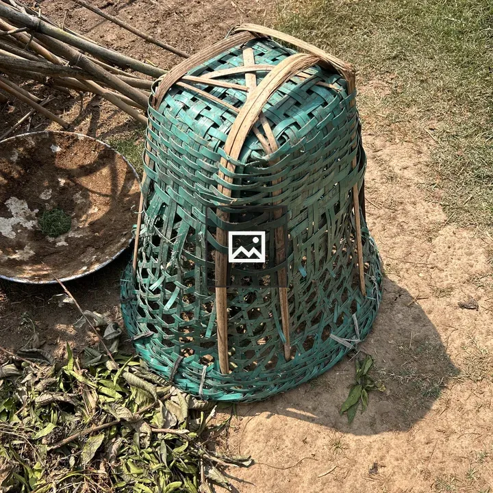 Green woven basket upside down