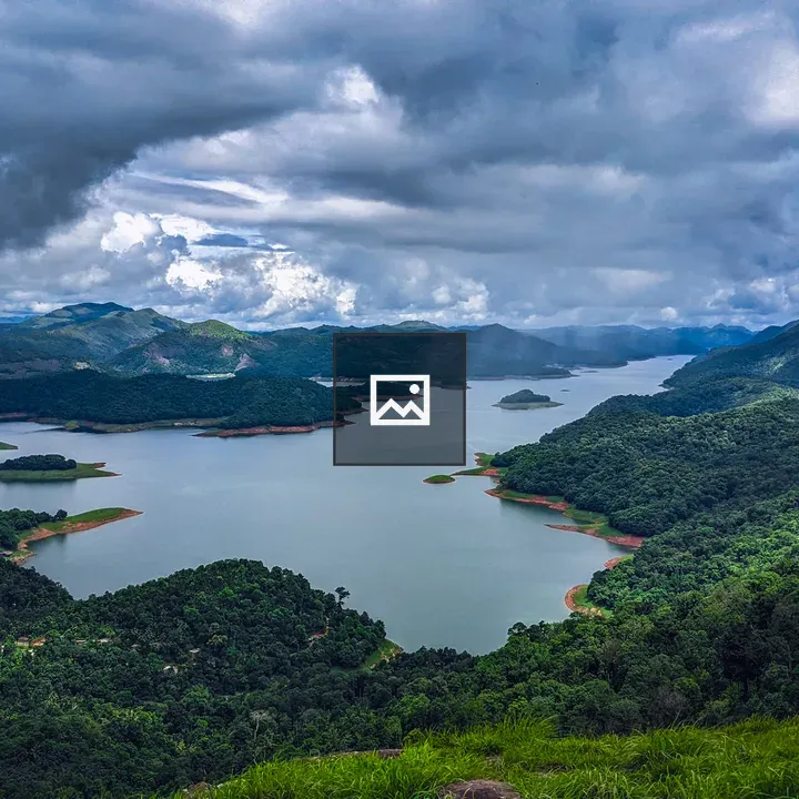 Mountain Lake with Cloudy Sky