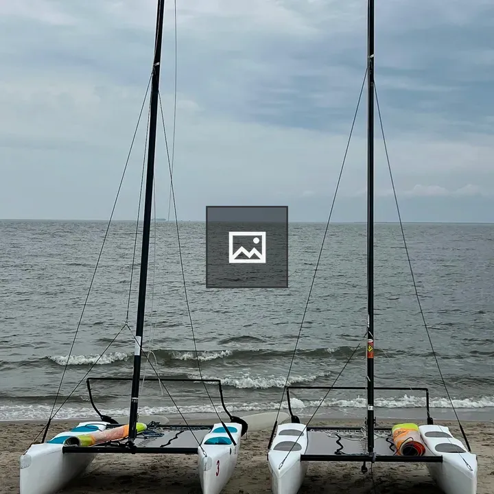 Two catamarans on the beach