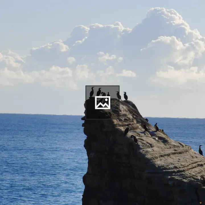 Rocky Cliff Over Ocean