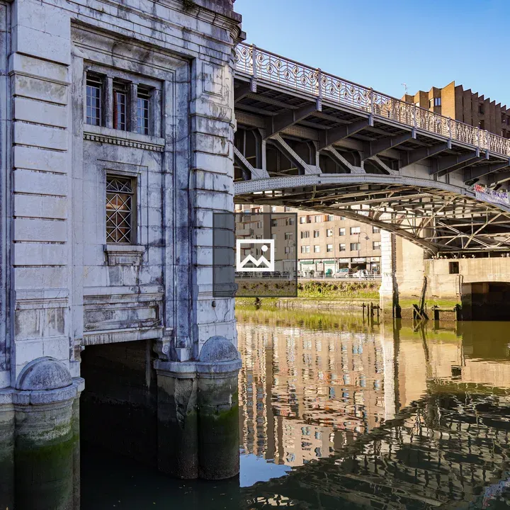 Old stone building by the river
