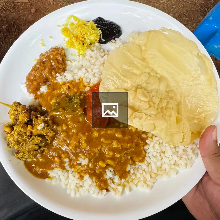 White plate with assorted food items