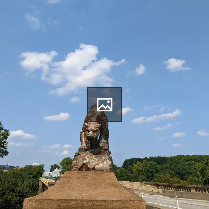 Tiger statue on bridge
