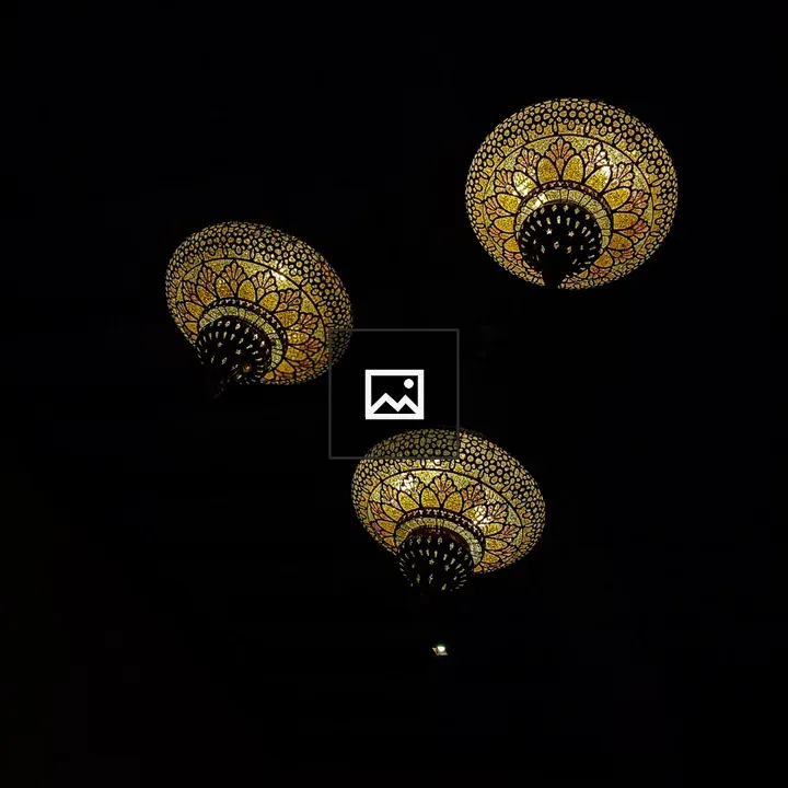 Three Dome Lamps Hanging from Ceiling