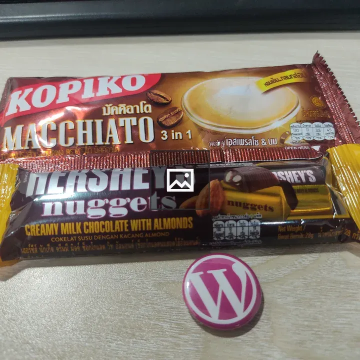 Coffee and WordPress Logo on Desk