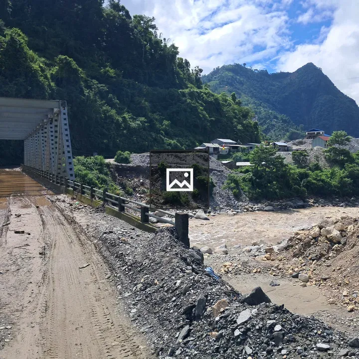 Mud Road to Metal Bridge