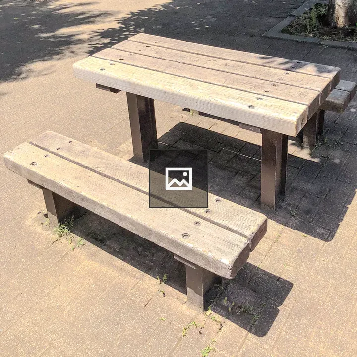 Wooden picnic table outdoors