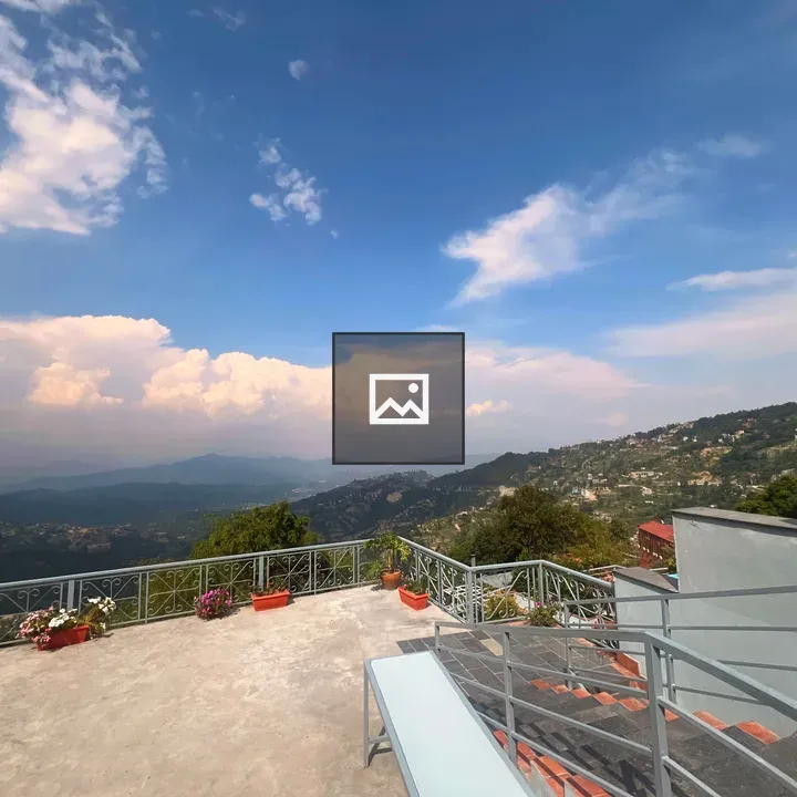 Rooftop View Over Green Hills