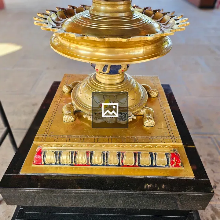 Base of traditional Kerala brass lamp