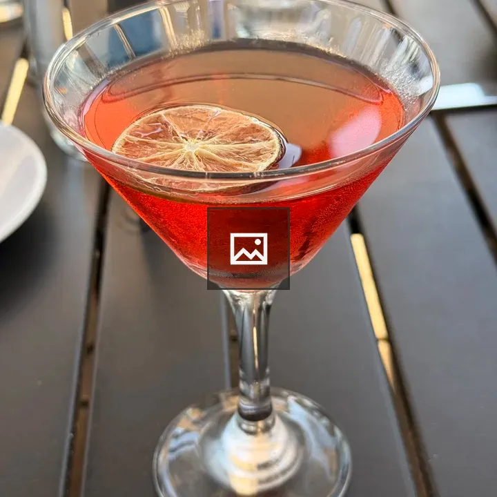 Red Cocktail in Martini Glass