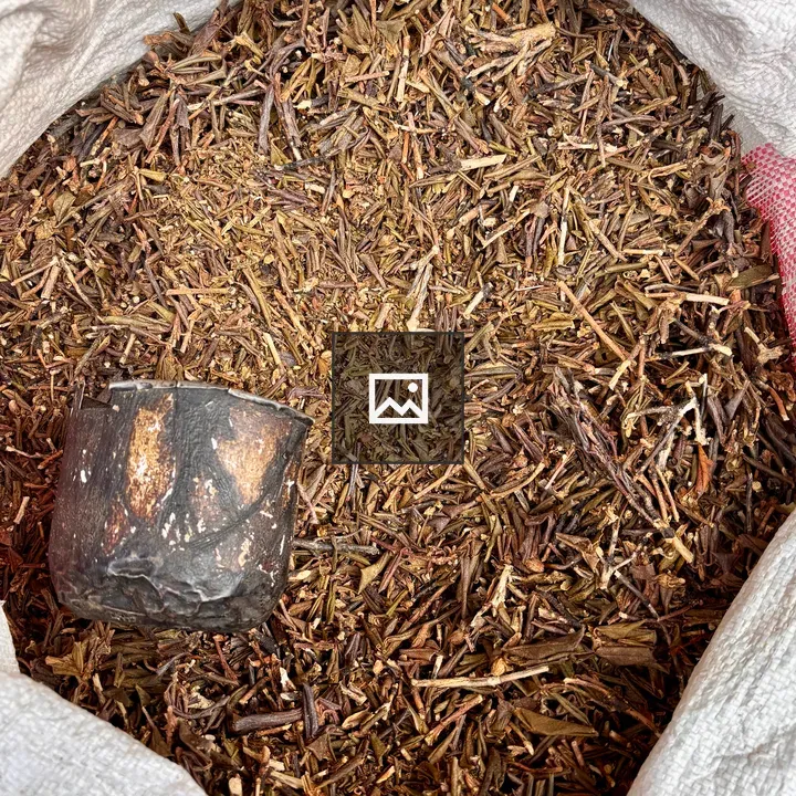 White Sack with Twigs and Cup