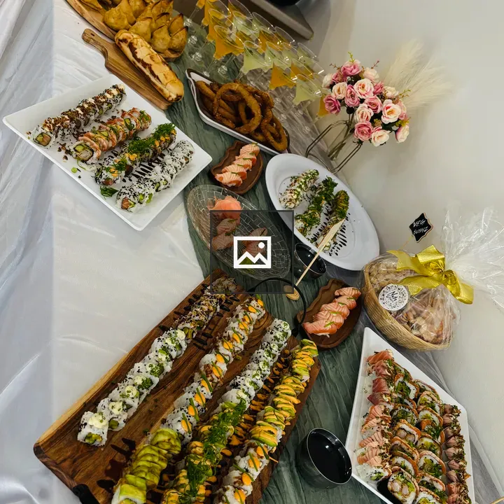 Table of assorted foods and flowers