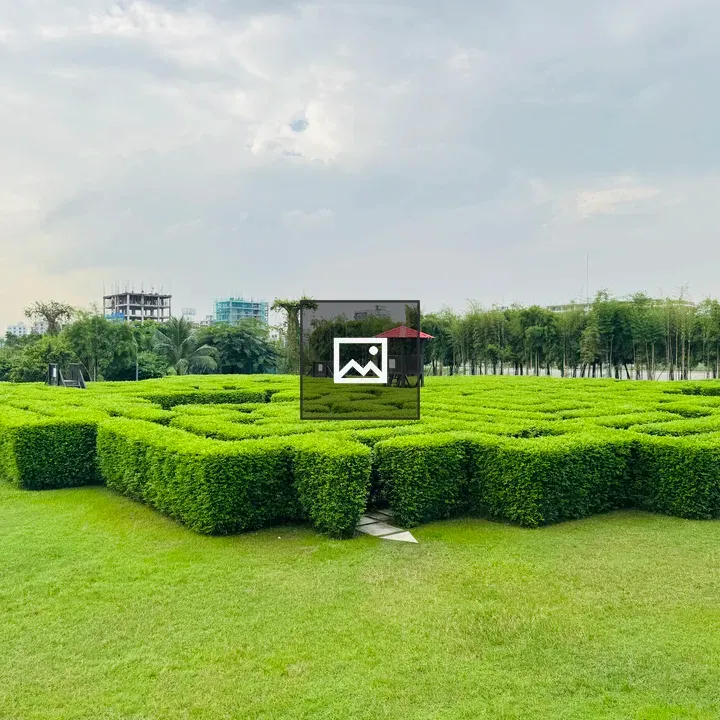 Green hedge maze with lookout tower