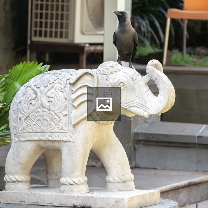 Stone Elephant Sculpture on Patio