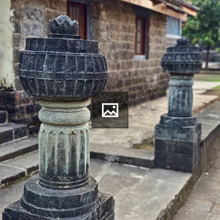 Two Stone Pillars at Entrance