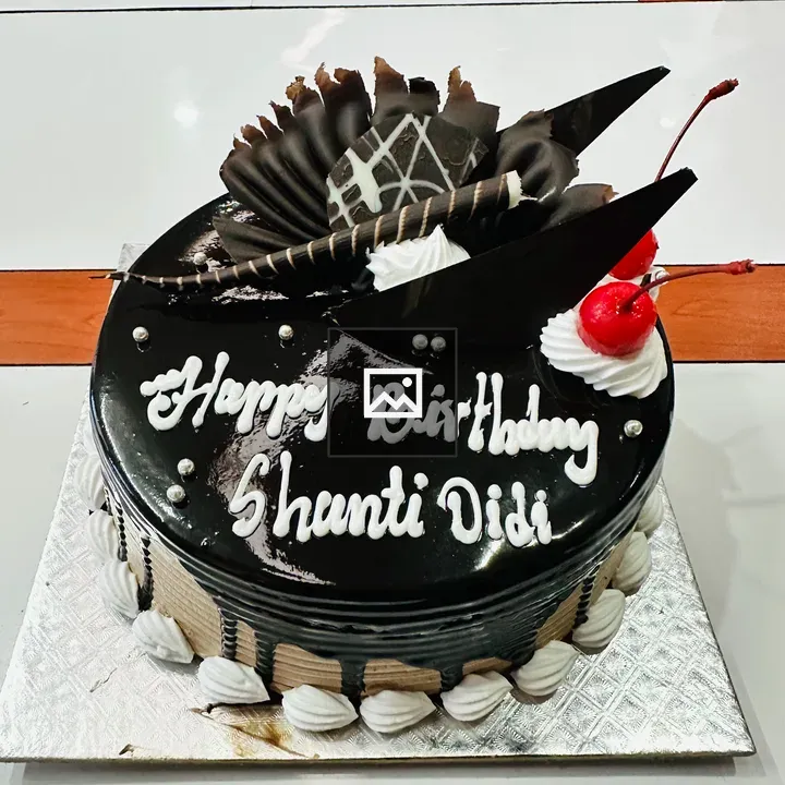 Birthday cake with chocolate and cherry