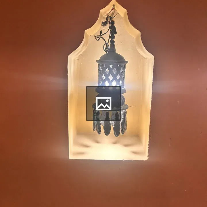 Decorative lantern in niche