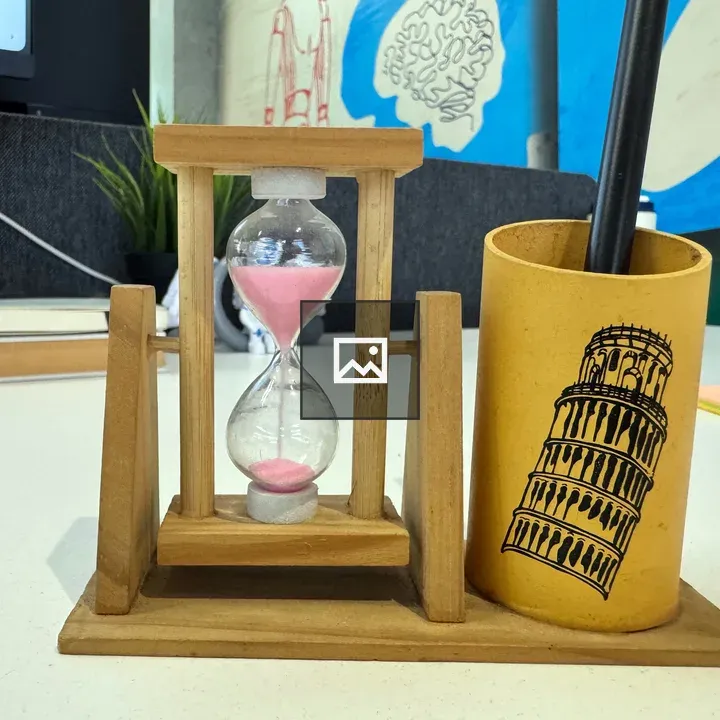 Wooden hourglass and pen holder