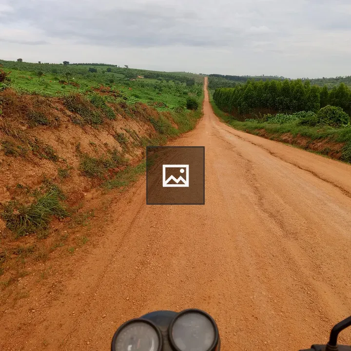 Motorbike on Dirt Road View