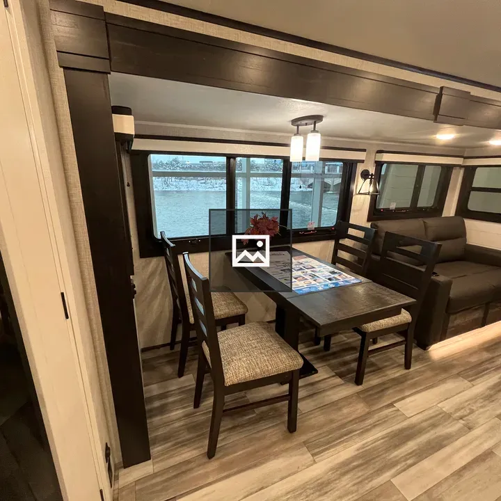 Table and chairs in RV slideout