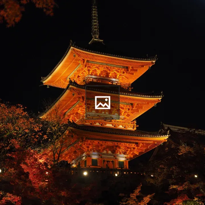 Three-tiered pagoda at night
