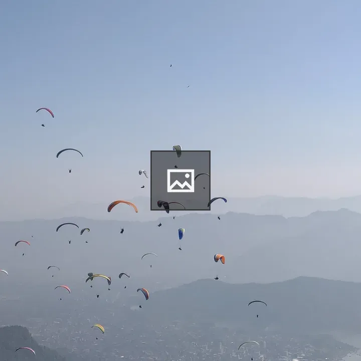 Paragliders over Pokhara sky