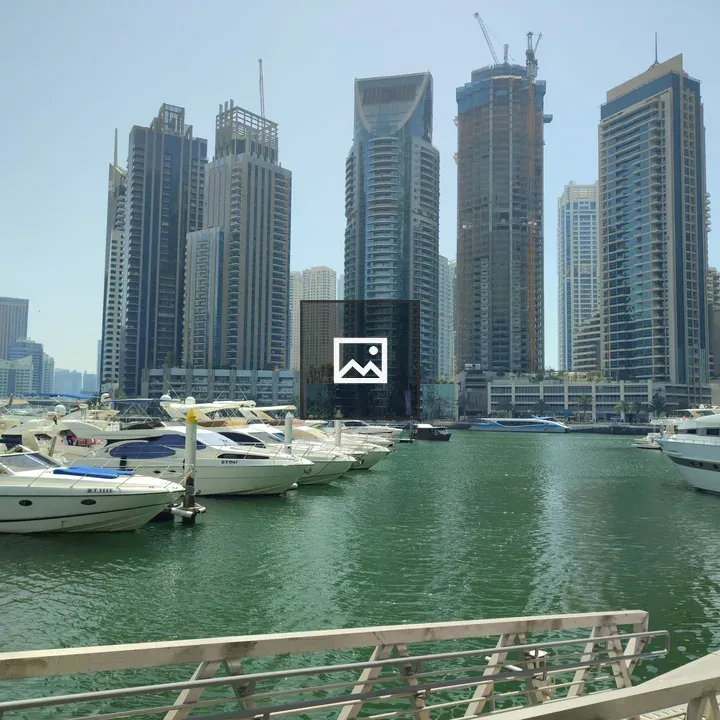 Dubai Marina skyline and boats