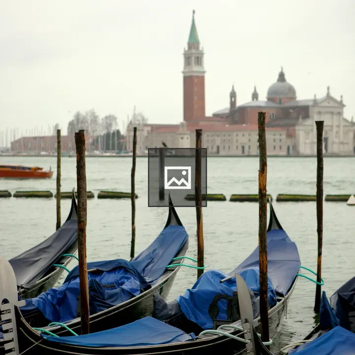 Gondolas Tied to Poles