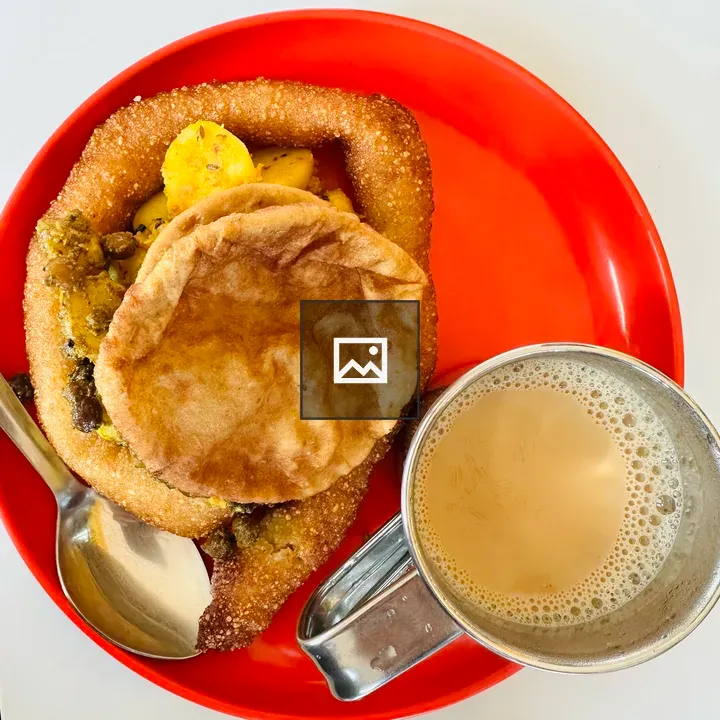 Sel Roti and Puri on Plate