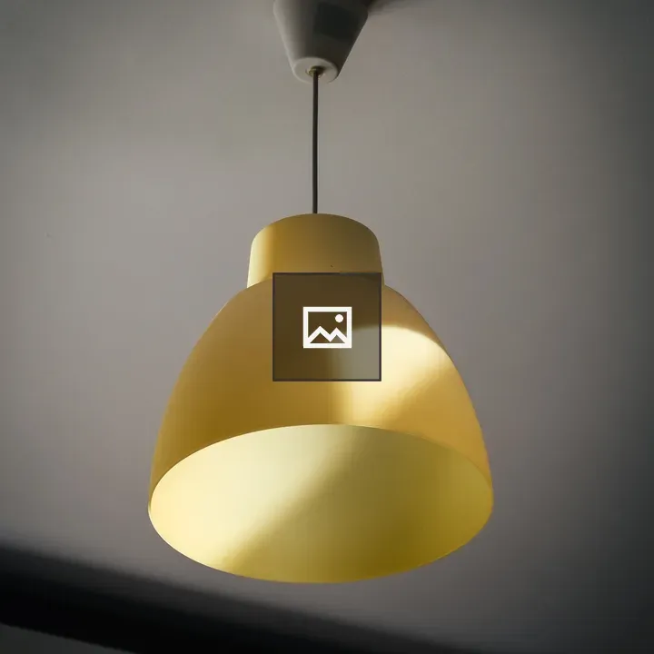 Sunlit yellow ceiling lamp
