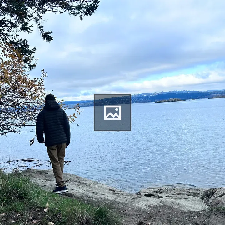Man Walking on Sea Beach