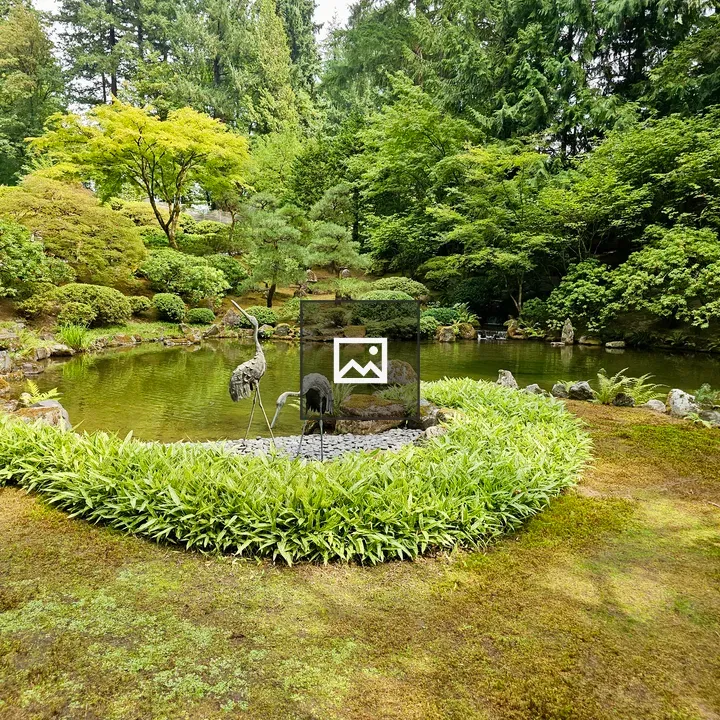 Pond with Crane Statues at Garden