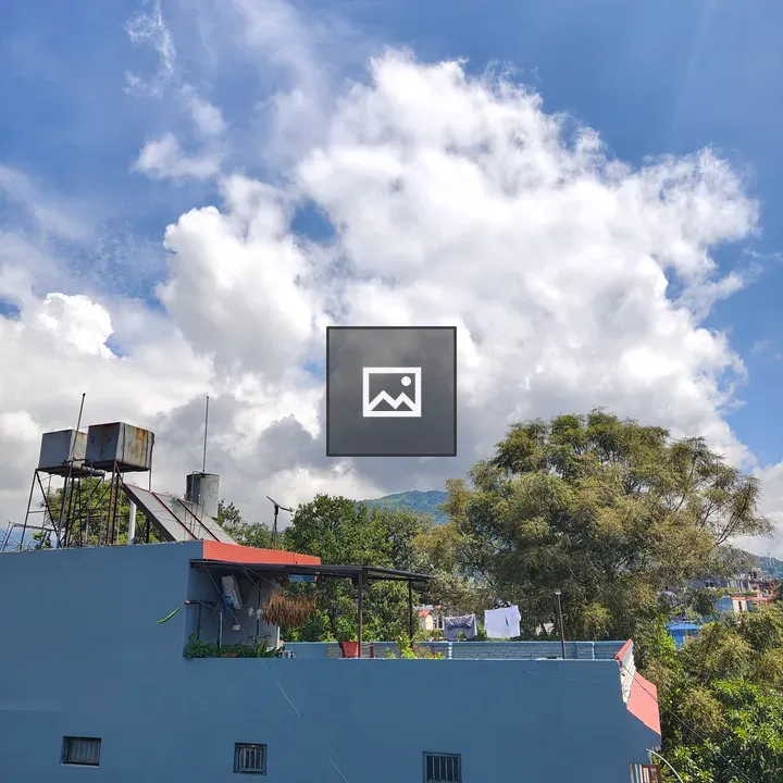 Blue building with clothesline