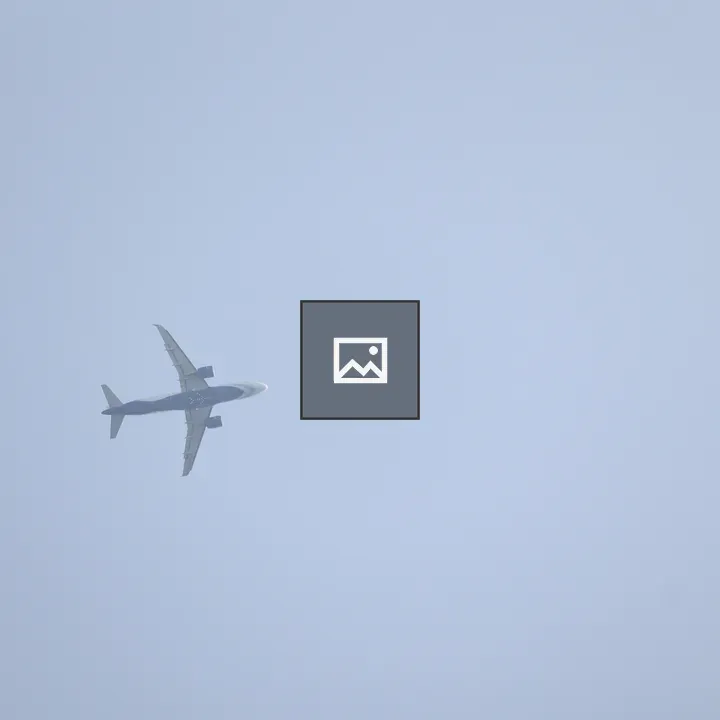 Airplane in Blue Sky