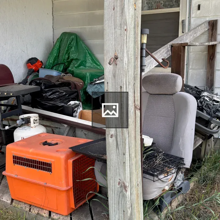 Porch Scene with Grill and Chair
