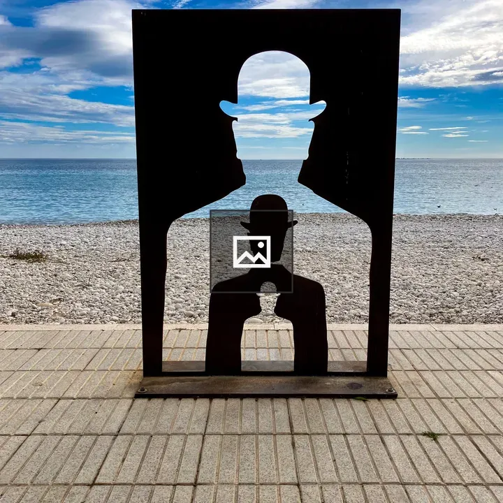 Man with Bowler Hat near Mediterranean Sea