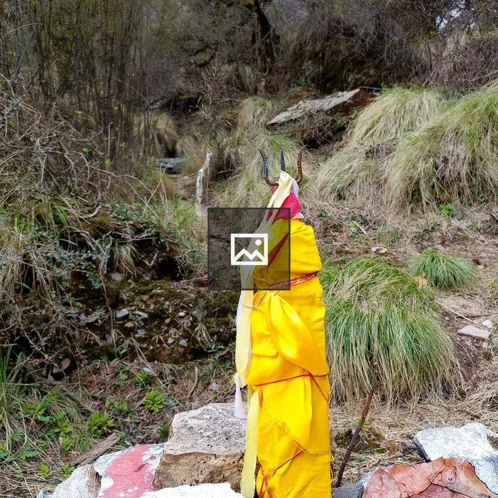 Trident Wrapped in Yellow Cloth