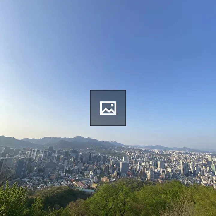 City Skyline with Mountains