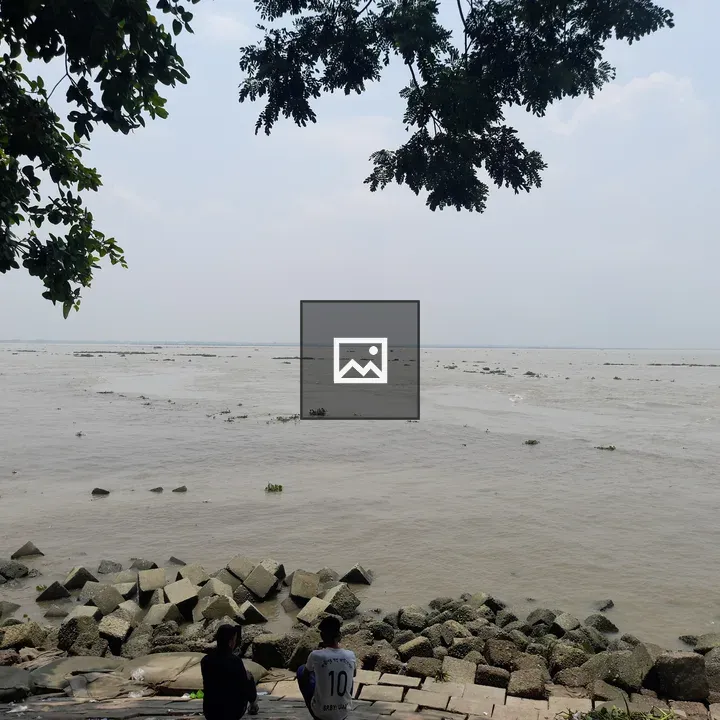 Riverside scene with two people
