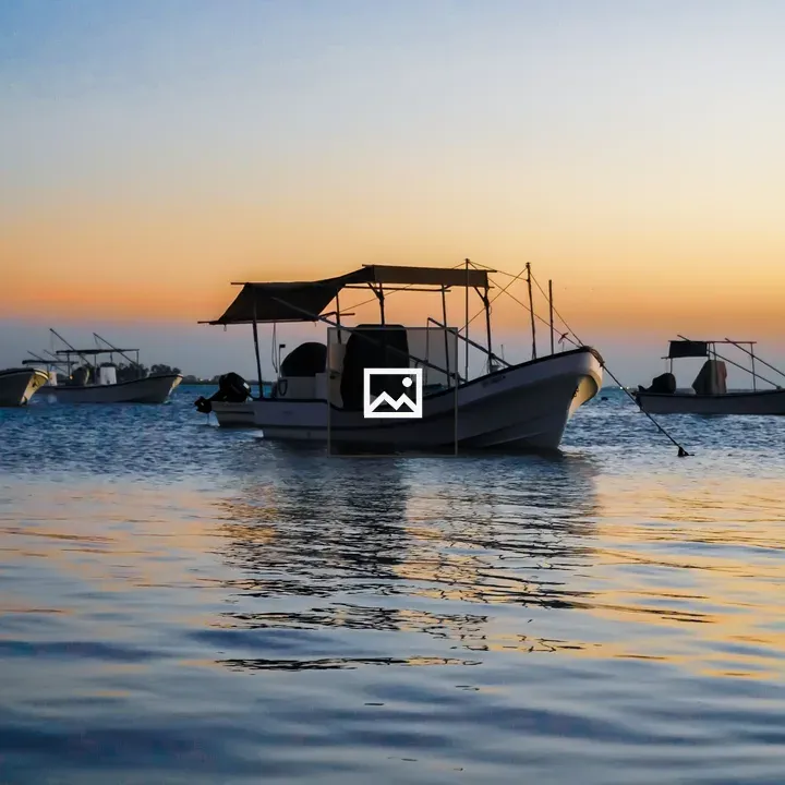 Malkiya Beach Boat at Sunset