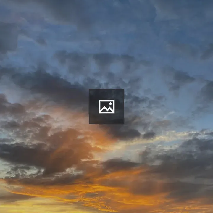 Sunset Over City Silhouette
