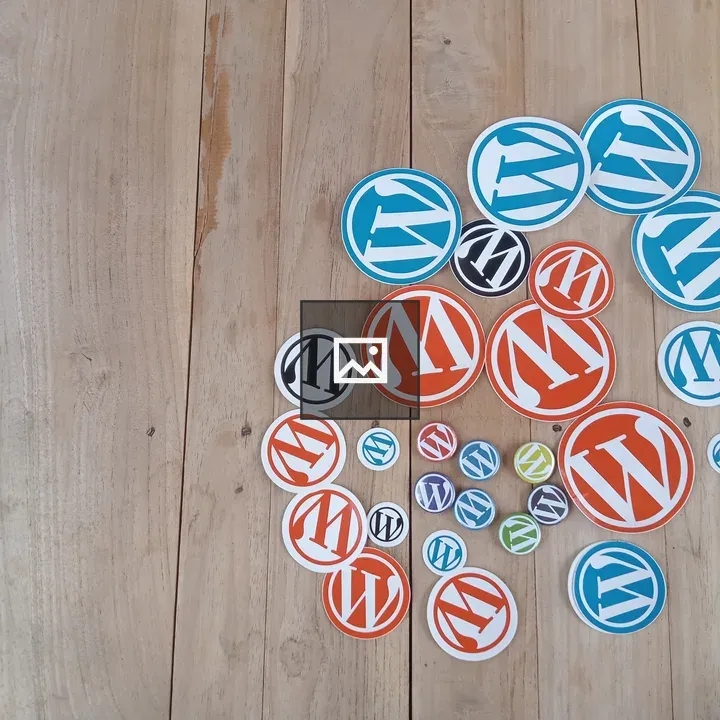 WordPress pins and stickers on board