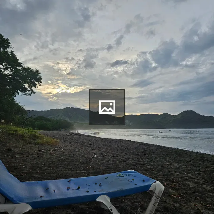 Blue lounge chair on beach
