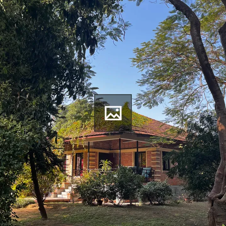 House with Red Tile Roof in Garden