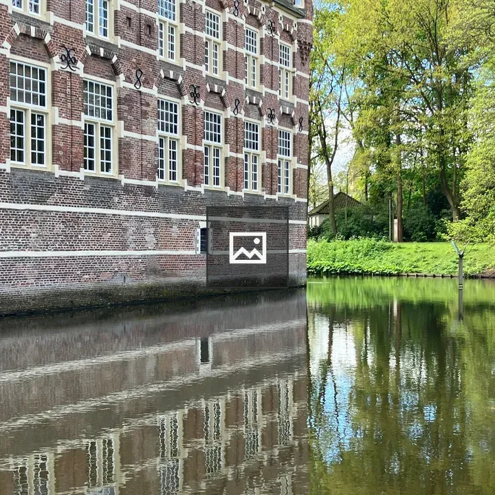 Castle reflected on water
