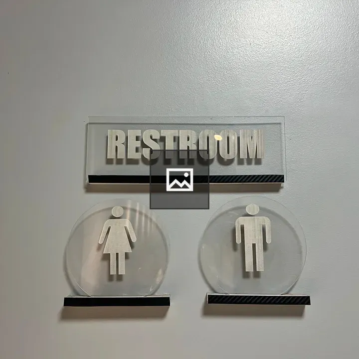 Restroom Sign on Wall