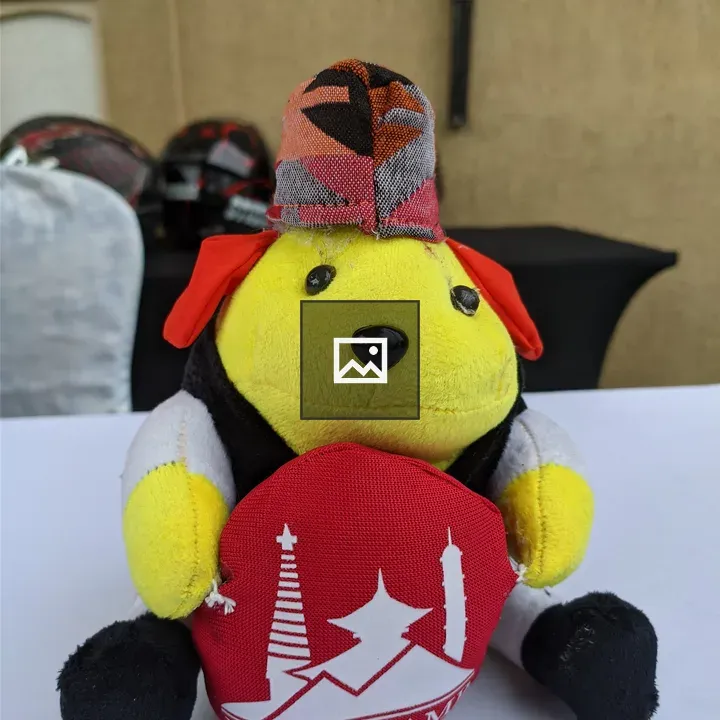 Portrait shot of a toy wapuu